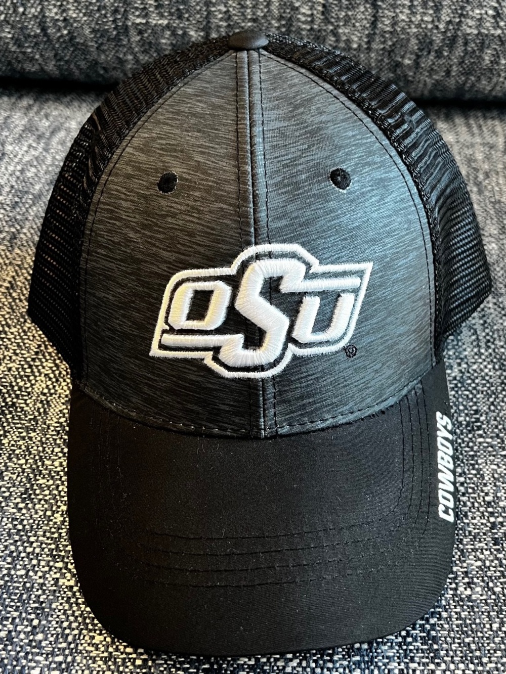 Captivating black OSU Cowboys baseball hat. Adjustable.